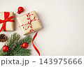 Gift boxes and christmas decorations on beige background, top view 143975666