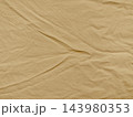 wrinkled beige linen texture radiating authentic sustainable wellness vibe for web design and advertising background featuring organic macro fold and calm minimalist composition 143980353