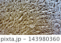 macro beige shag rug texture showing soft fluffy fibers for cozy wellness interior backgrounds in advertising and web design emphasizing sustainable comfort and tactile warmth 143980360