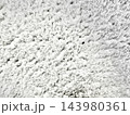 ultra soft white shag rug texture embodying cozy wellness atmosphere for web design background and ad campaign featuring high pile faux fur fiber radiating serene minimalist comfort 143980361