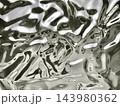 liquid chrome ripple distorts into a sleek futuristic abstract background texture for web design showcasing raw authenticity and fluid motion in monochrome silver black gradient 143980362
