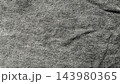 charcoal heathered knit fabric texture view revealing soft folds and woven grain for background use in web design and advertising emphasizing sustainable fashion and authentic minimalism 143980365