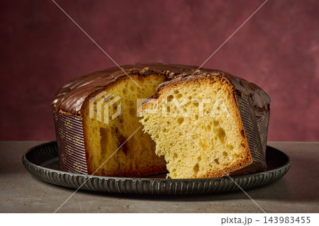 Panettone with caramel covered with chocolate 143983455