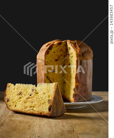 Artisan panettone with nuts and dried fruit Artisan panettone with nuts and dried fruit 143983457