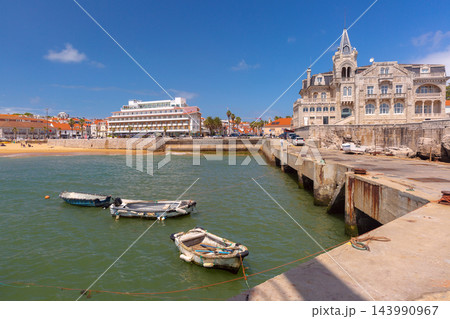 Fishing Boats in Cascais Harbor with Sandy Beach and Waterfront, Portugal Fishing Boats in Cascais Harbor with Sandy Beach and Waterfront, Portugal 143990967