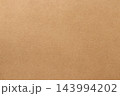 Brown cardboard sheet abstract background, texture of sepia color kraft paper with vintage pattern for design art work. 143994202
