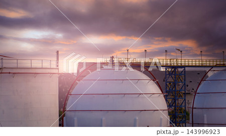 Industrial gas storage tank. LNG or liquefied natural gas storage tank. Energy price crisis. Gas tank in petroleum refinery. Energy crisis. Natural gas storage industry and global market consumption. 143996923