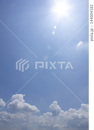 Blue sky with clouds and sun 144004382