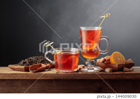 Black tea with lemon and brown sugar. 144009030
