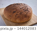 Homemade Whole Grain Bread Topped With Black Poppy Seeds 144012083