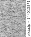 Grey cotton t-shirt fabric close up texture. Soft heathered grey fabric 144013871