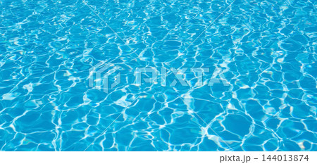 Clear blue water with wave, bright sun reflections. Clear blue water with wave, bright sun reflections. 144013874