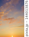 Sunrise northern sky and sun over distant horizon 144013876