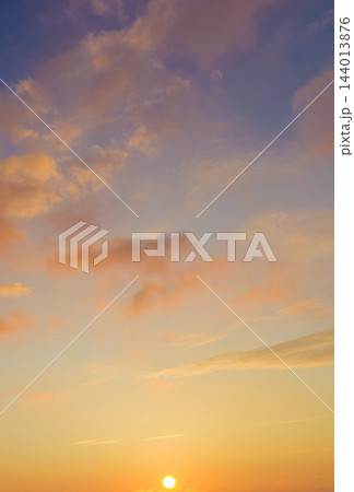 Sunrise northern sky and sun over distant horizon Sunrise northern sky and sun over distant horizon 144013876