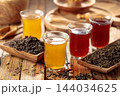 Black and green tea in small glass cups. 144034625