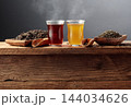 Black and green tea on an old wooden table. 144034626