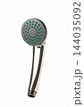 Chrome and dark grey shower head with green silicone nozzles isolated on white background  144035092