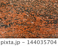 Old orange brown rough stone wall texture abstract pattern background structure backdrop floor surface 144035704