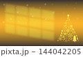 Elegant gold Christmas background with soft window light shadow, falling snowflakes and xmas tree 144042205
