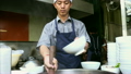 Chef preparing Asian street food and working in the restaurant kitchen, Phnom Penh, Cambodia 9051225