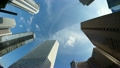 新宿高層ビル街を見上げる　青空に流れる雲  ［インターバル回転撮影 回転ズームイン→FIX］043-2 12187453