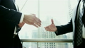 handshake Western Caucasian Arabic male business city buildings insurance growth 16482005