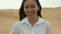 Asian woman smile outdoor desert wind blowing hair 18776763