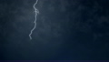 Dark thunderstorm clouds illuminated by 19108915