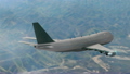 Aircraft flying over the mountains 20228046
