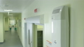 Lift Door Opens and Doctor Transports Patient alon 32044834