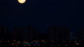 Moonset Over City Timelapse  33033026
