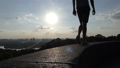 Young man walks on plates covering an embankment 38173833
