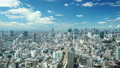 東京・爽やかな夏空・流れる白い雲　渋谷を中心とした都市風景　タイムラプス　ティルトアップ 38853211