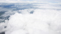Aerial view of clouds hrough airplane window 43787646