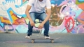 Man does stunts with a skateboard, slow motion. 44707404