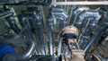 Steel pipes at a factory, bottom view. 46120282