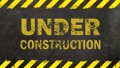 Black background with under construction sign 56646799