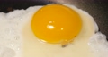 SS00456 Egg on a frying pan in cooking.mov 57218431