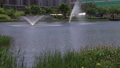 Fountain sprinkled by the lake 59656146