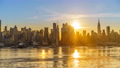 Timelapse of sunrise over Manhattan skyline 64929020