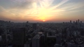 日本 東京 ビル群 街並み 風景 空撮 俯瞰 夜から朝 日の出 朝日 長時間タイムラプス撮影 65632736