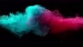 Super Slowmotion Shot of Color Powder Explosion Isolated on Black Background. 70318558