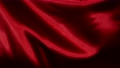 Red wavy fabric background in super slow motion, 4K 71771904
