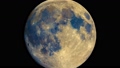 Full moon seen with telescope, enhanced colours 76087061