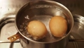 two eggs boiling 76444278