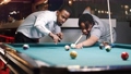 Shot of a young black male in a billiards playroom 78960728