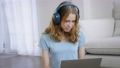 Girl using smartphone and laptop with headphones 79731110