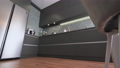 Modern luxury dark gray kitchen shot from low angle 80678699