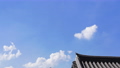 peaceful clouds passing over the roof of traditional korean hanok 81569291