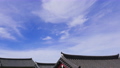 peaceful clouds passing over the roof of traditional korean hanok 81569292